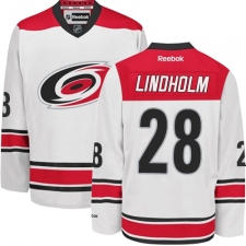 Youth Reebok Carolina Hurricanes #28 Elias Lindholm Authentic White Away NHL Jersey