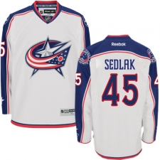 Women's Reebok Columbus Blue Jackets #45 Lukas Sedlak Authentic White Away NHL Jersey