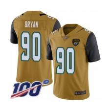 Men's Jacksonville Jaguars #90 Taven Bryan Limited Gold Rush Vapor Untouchable 100th Season Football Jersey