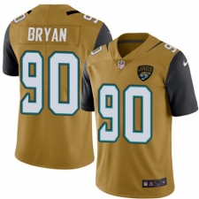 Men's Nike Jacksonville Jaguars #90 Taven Bryan Limited Gold Rush Vapor Untouchable NFL Jersey