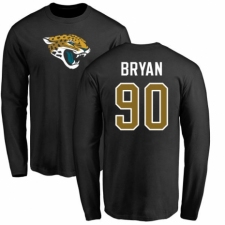 NFL Nike Jacksonville Jaguars #90 Taven Bryan Black Name & Number Logo Long Sleeve T-Shirt