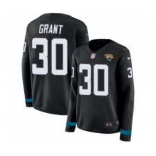 Women's Nike Jacksonville Jaguars #30 Corey Grant Limited Black Therma Long Sleeve NFL Jersey